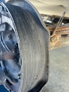 A worn brake shoe.