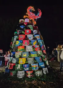 Each December, holiday festivities in Rock Hall, Maryland, include the lighting of a Christmas tree made from crab baskets, as shown in James Lacey’s photo.